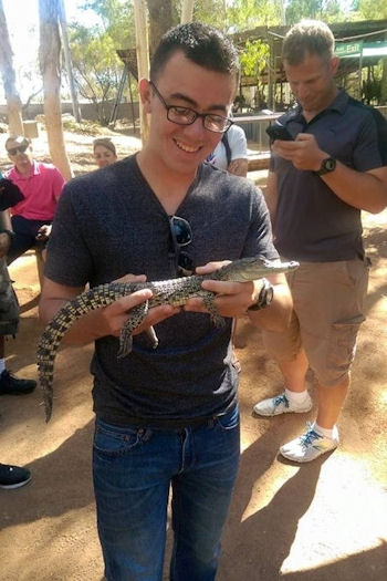 Patrick with crocodile in Australia